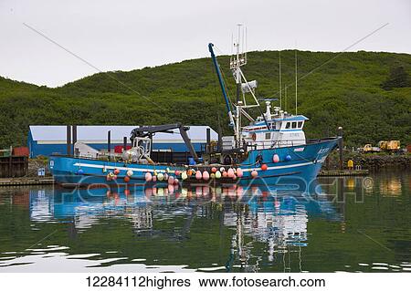 Buoys hanging off the side of a blue fishing boat, Sand Point Harbor, Southwestern Alaska, USA, Summer View Large Photo Image Stock Photograph - Buoys hanging off the side of a blue fishing boat, Sand Point Harbor, Southwestern Alaska, USA, Summer. Fotosearch