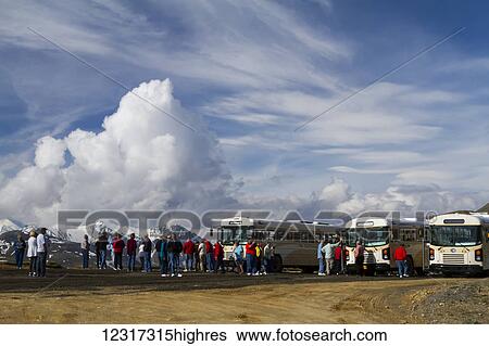 Stock Photograph - Bus loads of visitors to Denali National Park and Preserve stop at Stony Hill Overlook for a break, Interior Alaska, USA. Fotosearch