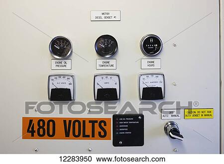 Stock Image - Buttons and switches on a diesel generator control panel, electrical Power Plant, St. Paul Island, Southwestern Alaska, USA, Summer. Fotosearch