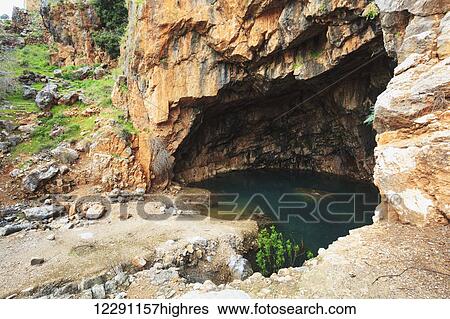 Stock Photograph - Caesarea Philippi, an ancient Roman city now uninhabited and an archaeological site in the Golan Heights; Caesarea Philippi, Israel. Fotosearch