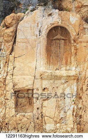 Stock Photograph - Caesarea Philippi, an ancient Roman city now uninhabited and an archaeological site in the Golan Heights; Caesarea Philippi, Israel. Fotosearch