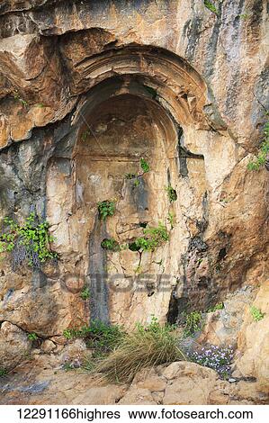 Stock Photograph - Caesarea Philippi, an ancient Roman city now uninhabited and an archaeological site in the Golan Heights; Caesarea Philippi, Israel. Fotosearch