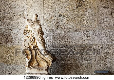 Stock Photograph - Carved statue, Ancient Agora Museum; Athens, Greece. Fotosearch