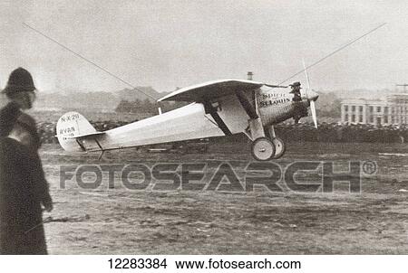 Charles Lindbergh landing at Croyden, England in 1927 in his plane Spirit of St. Louis. From The Story of 25 Eventful Years in Pictures, published 1935. View Large Photo Image Picture - Charles Lindbergh landing at Croyden, England in 1927 in his plane Spirit of St. Louis. From The Story of 25 Eventful Years in Pictures, published 1935.. Fotosearch