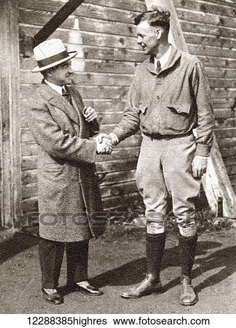 Charles Lindbergh (right) being welcomed on his arrival in Paris in 1927 by French aviator Rene Fonck. Charles Augustus Lindbergh, 1902 1974. American aviator, author, inventor, explorer, and social activist. From The Story of 25 Eventful Years in... View Large Photo Image Stock Photograph - Charles Lindbergh (right) being welcomed on his arrival in Paris in 1927 by French aviator Rene Fonck. Charles Augustus Lindbergh, 1902 1974. American aviator, author, inventor, explorer, and social activist. From The Story of 25 Eventful Years in.... Fotosearch