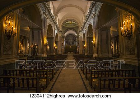 Stock Photograph - Church lit by electric candles; Buenos Aires, Argentina. Fotosearch