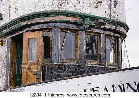 Stock Photograph - Close up of the weathered outside walls of a fishing boat, Sand Point Harbor, Sand Point, Southwestern Alaska, USA, Summer. Fotosearch