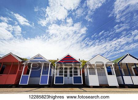 Stock Photograph - Colourful beach huts; Southwold, Suffolk, England. Fotosearch