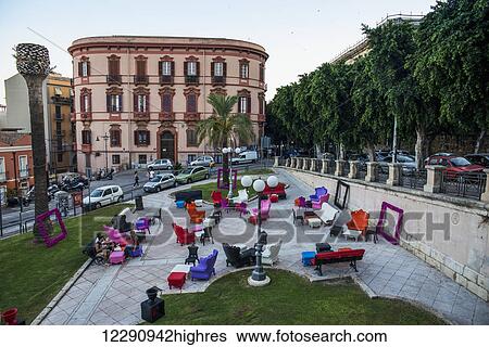 Colourful furniture in a town square; Cagliari, Sardinia, Italy View Large Photo Image Stock Photograph - Colourful furniture in a town square; Cagliari, Sardinia, Italy. Fotosearch