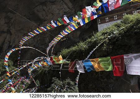 Stock Photograph - Colourful prayer flags, Taktsang trail; Paro, Bhutan. Fotosearch