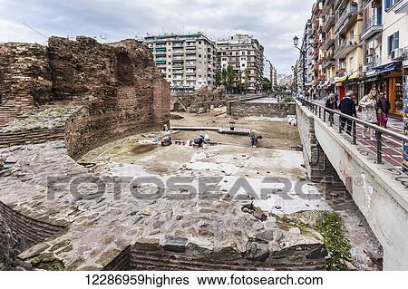 Stock Photograph - Contrast between new residential buildings and ruins; Thessaloniki, Greece. Fotosearch