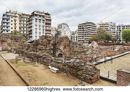 Stock Photograph - Contrast between new residential buildings and ruins; Thessaloniki, Greece. Fotosearch