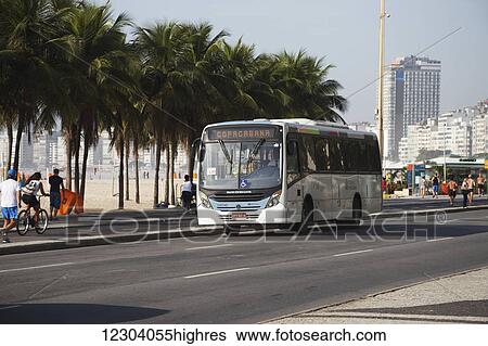 Copacabana bus on Avenue Atlantica at Copacabana Beach; Rio de Janeiro, Brazil View Large Photo Image Stock Photograph - Copacabana bus on Avenue Atlantica at Copacabana Beach; Rio de Janeiro, Brazil. Fotosearch