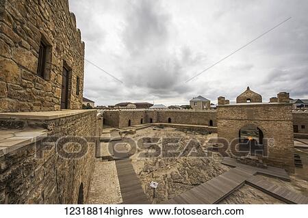 Stock Photograph - Courtyard of the Ateshgah Temple or Fire Temple of Baku, a Hindu and Zoroastrian place of worship; Surakhani, Baku, Azerbaijan. Fotosearch