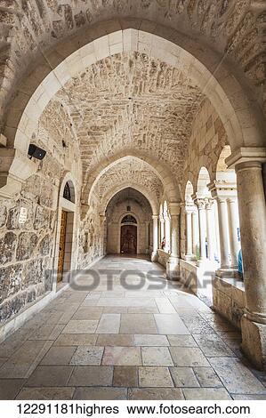 Stock Photograph - Covered walkway at the Church of St. Catherine; Bethlehem, Israel. Fotosearch