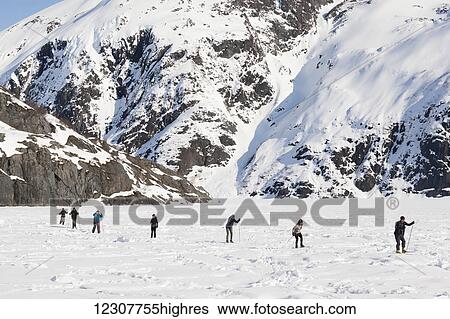 Cross Country Skiers at Portage Glacier. Southcentral Alaska. Winter. View Large Photo Image Stock Photograph - Cross Country Skiers at Portage Glacier. Southcentral Alaska. Winter.. Fotosearch