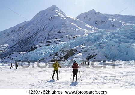 Cross Country Skiers at Portage Glacier. Southcentral Alaska. Winter. View Large Photo Image Stock Photograph - Cross Country Skiers at Portage Glacier. Southcentral Alaska. Winter.. Fotosearch