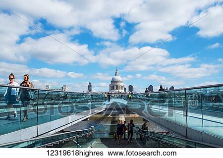Stock Photograph - Crossing Millennium Bridge to St Paul's Cathedral; London, England. Fotosearch