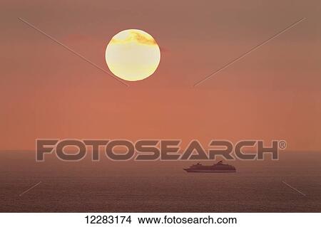 Cruise ship along Kona coast of Hawaii at sunset; Island of Hawaii, Hawaii, United States of America View Large Photo Image Picture - Cruise ship along Kona coast of Hawaii at sunset; Island of Hawaii, Hawaii, United States of America. Fotosearch