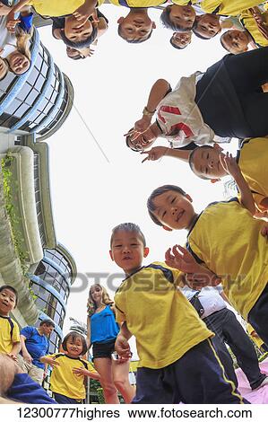 Stock Photograph - Cultural visit at Number 2 Kindergarten; Guangzhou, China. Fotosearch