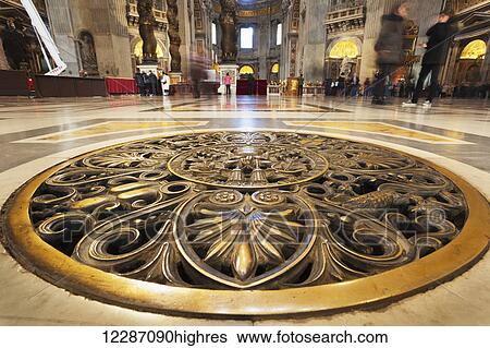 Decorative metal gold floor cover, St. Peter's Basilica; Rome, Italy View Large Photo Image Stock Photograph - Decorative metal gold floor cover, St. Peter's Basilica; Rome, Italy. Fotosearch