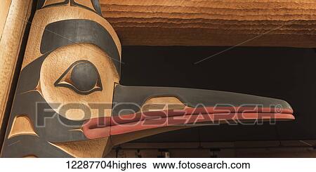 Detail of bird-like figure on totem; Tofino, Vancouver Island, British Columbia, Canada View Large Photo Image Stock Photograph - Detail of bird-like figure on totem; Tofino, Vancouver Island, British Columbia, Canada. Fotosearch
