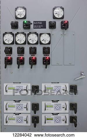 Dials and switches on a diesel generator control panel, electrical Power Plant, Sand Point, Southwestern Alaska, USA, Summer View Large Photo Image Stock Image - Dials and switches on a diesel generator control panel, electrical Power Plant, Sand Point, Southwestern Alaska, USA, Summer. Fotosearch