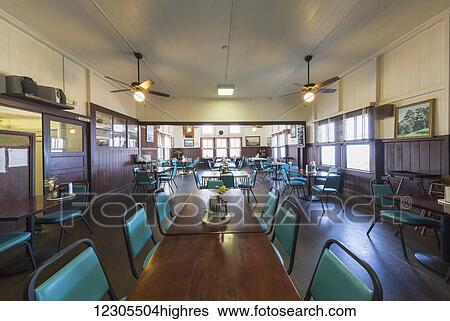 Stock Photograph - Dining room of 100 year old Mangao Hotel, oldest in Hawaii; Captain Cook, Island of Hawaii, Hawaii, United States of America. Fotosearch