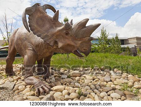Stock Photograph - Dinosaur sculpture outdoors at the Royal Tyrell Museum of Palaeontology; Drumheller, Alberta, Canada. Fotosearch