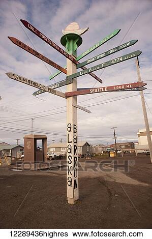 Direction signpost pointing to cities around the world from the streets of Barrow, North Slope, Arctic Alaska, Summer View Large Photo Image Stock Photograph - Direction signpost pointing to cities around the world from the streets of Barrow, North Slope, Arctic Alaska, Summer. Fotosearch