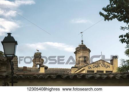 Stock Photograph - Downtown Alcala de Henares, a historical and charming city near to Madrid; Alcala de Henares, Madrid, Spain. Fotosearch