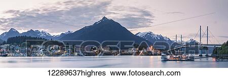 Downtown Sitka and the O'Connell bridge at sunset with the Sisters Mountains in the background, Southeast Alaska, USA, Summer View Large Photo Image Stock Photograph - Downtown Sitka and the O'Connell bridge at sunset with the Sisters Mountains in the background, Southeast Alaska, USA, Summer. Fotosearch