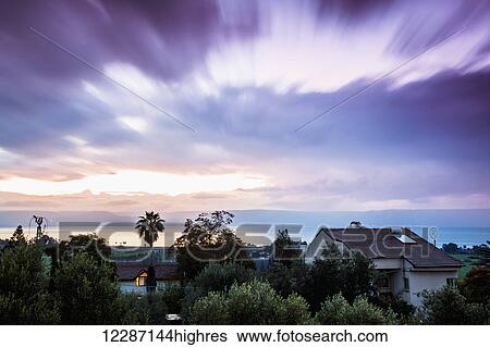 Dramatic cloud formation at sunrise over the sea of Galilee; Israel View Large Photo Image Stock Photograph - Dramatic cloud formation at sunrise over the sea of Galilee; Israel. Fotosearch