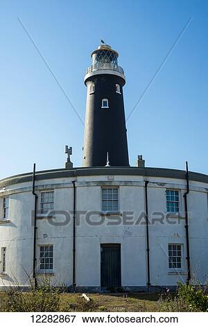 Dungeness old lighthouse; Dungeness, Kent, England View Large Photo Image Stock Photo - Dungeness old lighthouse; Dungeness, Kent, England. Fotosearch
