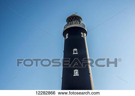 Dungeness old lighthouse; Dungeness, Kent, England View Large Photo Image Stock Photograph - Dungeness old lighthouse; Dungeness, Kent, England. Fotosearch
