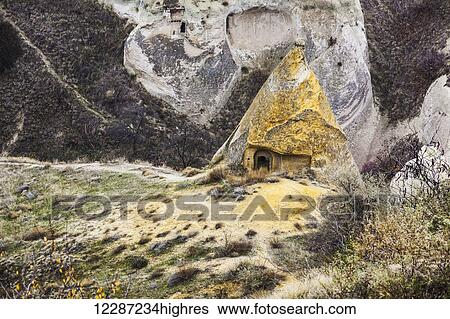 Stock Photograph - Dwellings in fairy chimneys: Goreme, Cappadocia, Turkey. Fotosearch