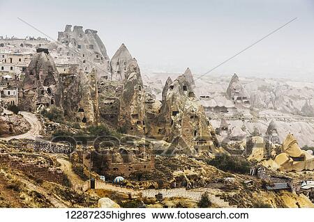Dwellings in fairy chimneys: Goreme, Cappadocia, Turkey View Large Photo Image Stock Photograph - Dwellings in fairy chimneys: Goreme, Cappadocia, Turkey. Fotosearch