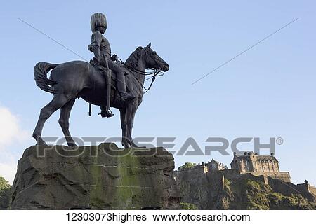 Stock Photograph - Edinburgh Castle and equestrian statue; Edinburgh, Scotland. Fotosearch