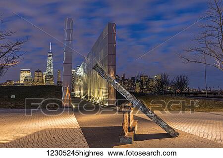 Stock Photograph - Empty Sky: New Jersey September 11th Memorial at twilight, Liberty State Park; Jersey City, New Jersey, United States of America. Fotosearch