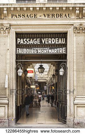 Entrance of covered shopping street leading to faubourg Montmartre; Paris, France View Large Photo Image Stock Photograph - Entrance of covered shopping street leading to faubourg Montmartre; Paris, France. Fotosearch