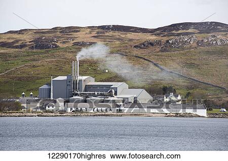 Stock Photograph - Exhaust coming from stacks on a building on the water's edge at Port Ellen; Isle of Islay, Scotland. Fotosearch