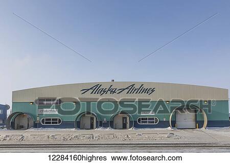 Exterior view of the Alaska Airlines hanger, Barrow, North Slope, Arctic Alaska, USA, Winter View Large Photo Image Stock Photograph - Exterior view of the Alaska Airlines hanger, Barrow, North Slope, Arctic Alaska, USA, Winter. Fotosearch