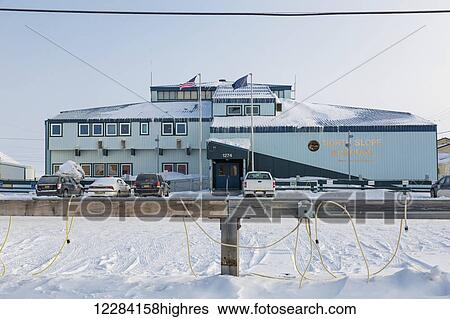 Stock Photograph - Exterior view of the North Slope Borough Headquarters Office, Barrow, North Slope, Arctic Alaska, USA, Winter. Fotosearch