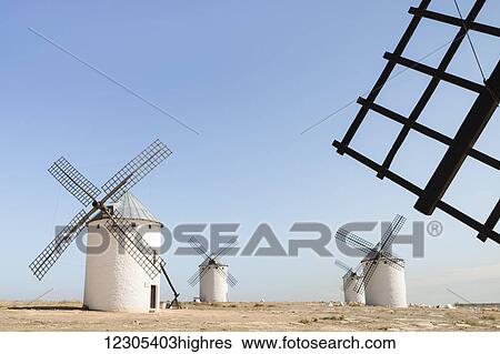 Stock Photograph - Famous windmills in Campo Criptana, where the stories of Don Quixote come from; Ciudad Real, Castile-La Mancha, Spain. Fotosearch