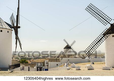 Stock Photograph - Famous windmills in Campo Criptana, where the stories of Don Quixote come from; Ciudad Real, Castile-La Mancha, Spain. Fotosearch