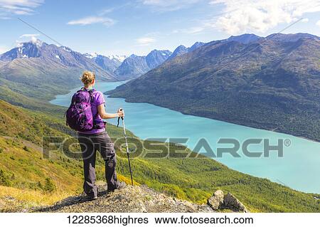 Female hiker overlooking Eklutna Lake from Twin Peaks Trail, Chugach State Park, Southcentral Alaska, summer View Large Photo Image Stock Photograph - Female hiker overlooking Eklutna Lake from Twin Peaks Trail, Chugach State Park, Southcentral Alaska, summer. Fotosearch