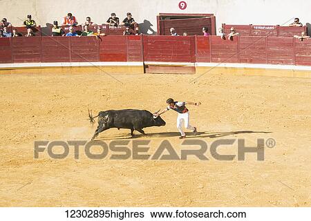 Stock Photograph - Festival in Alcala de Henares and the bullring; Madrid, Spain. Fotosearch