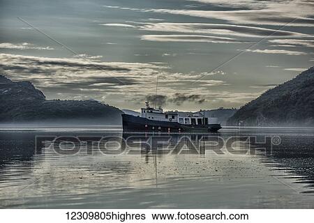 Fishing vessel in Geographic Harbor at sunrise, Southwest Alaska, USA View Large Photo Image Stock Photograph - Fishing vessel in Geographic Harbor at sunrise, Southwest Alaska, USA. Fotosearch