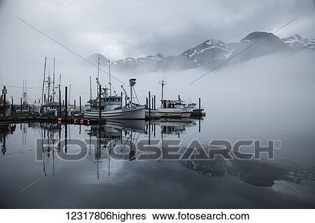 Fog filled boat harbor at Pelican on Chichagof Island, Southeast Alaska, USA View Large Photo Image Stock Photograph - Fog filled boat harbor at Pelican on Chichagof Island, Southeast Alaska, USA. Fotosearch