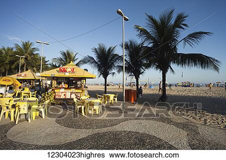 Stock Photograph - Food and drink kiosk on Copacabana Beach; Rio de Janeiro, Brazil. Fotosearch